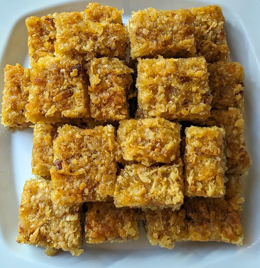 Cassava pone squares, golden and chewy-edged